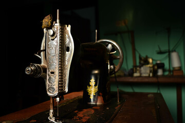 an old antique sewing machine on table wood