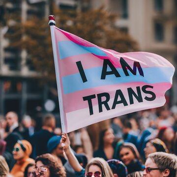 People protest in a street city with flag concept trans sexuality woman girl