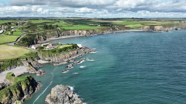 Aerial coast Ireland safe harbour at Boatstrand Copper Coast Waterford quaint fishing village with a sheltered harbour