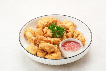 Crispy chicken fillets (ayam goreng tepung) with chilli sauce
