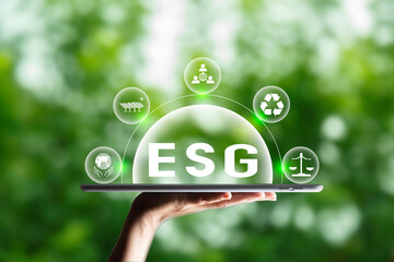 Green Energy Renewable sustainable. ESG on smartphone at nature green grass background. green energy icon around it. Carbon dioxide emission in industry net zero carbon concept.
