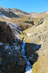 Running river on the path to mount Elbrus, Russia