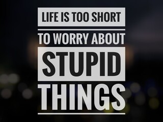 Motivational quote "Life is too short to worry about stupid things" on abstract dark background.