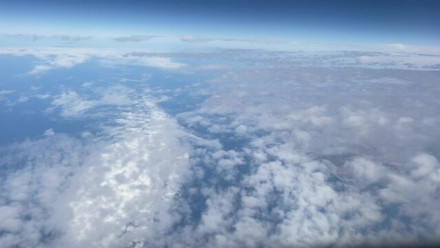 clouds at 10,000 meters high from a plane, ideal for background and Copy Space