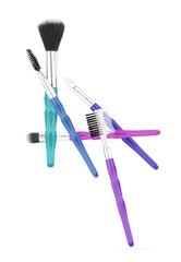Various makeup brushes on white background