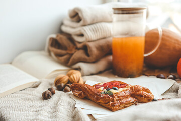 Sweet pastry and cup of tea, good autumn morning concept
