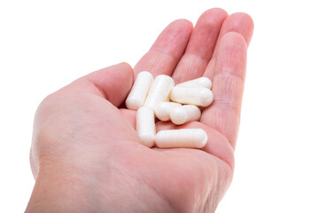 medical capsules in hand isolated