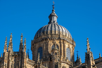 Fototapeta na wymiar Low angle view of the Romanesque dome and capital of the ancient cathedral of Salamanca. Castilla y León, Spain.