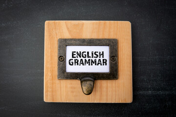 English Grammar. File cabinet label. Chalkboard background