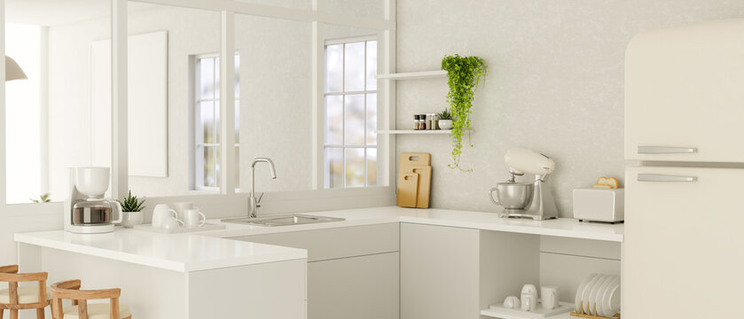 Modern temporary white kitchen with white counter, decoration and fridge with window nearby.