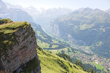 Fototapeta na wymiar landscape in switzerland, view from the Mannlichen, a 2342 m above sea level. M. high mountain in the Lauterbrunnen valley. 