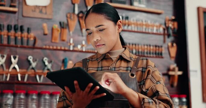 Leather workshop, woman with tablet and tools for manufacturing of unique textile product. Ecommerce, small business owner and girl at factory with online checklist, digital app and repair service.