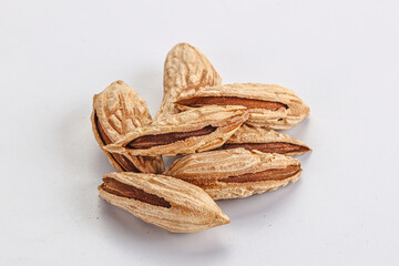 Shelled dry almond nut heap