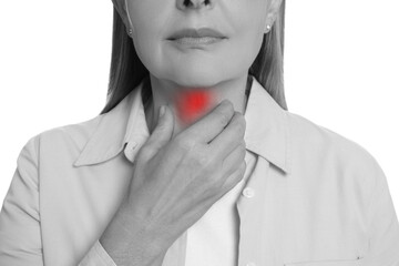 Endocrine system. Woman doing thyroid self examination on white background, closeup. Color accent...