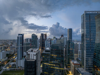 Fototapeta premium Skyline of Miami downtown at dusk. Florida, United States, Miami City on Sunny Day, USA. Aerial View stock photo, Miami skyline as seen from air