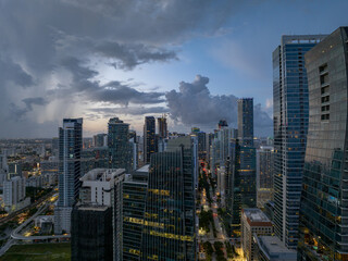 Fototapeta premium Skyline of Miami downtown at dusk. Florida, United States, Miami City on Sunny Day, USA. Aerial View stock photo, Miami skyline as seen from air