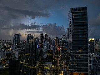 Obraz premium Skyline of Miami downtown at dusk. Florida, United States, Miami City on Sunny Day, USA. Aerial View stock photo, Miami skyline as seen from air