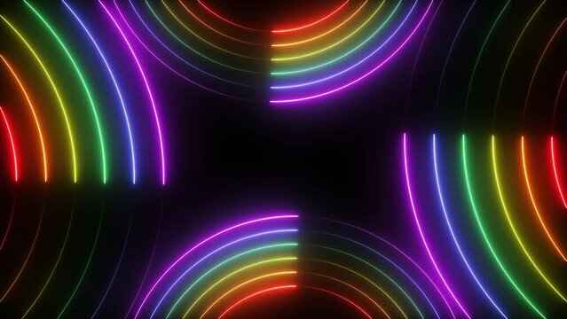 Abstract neon glowing rainbow circles motion graphics on black background. Seamless looping animation