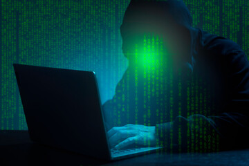 Cyber Security Concept. Computer Hacker in Hoodie. Obscured Dark Face. Hacker Attack, Virus Infected Software.