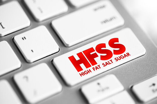 HFSS (High Fat Salt Sugar) acronym - term for food and beverage products which are high in saturated fat, salt and sugar, text concept button on keyboard