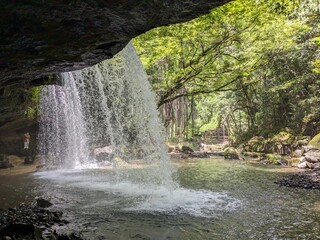 The Nabegataki Falls, where travelers can access the large cavern behind the falls