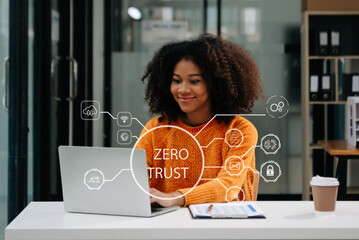 Zero trust security concept Person using computer and tablet with zero trust icon on virtual screen...