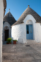 Fototapeta na wymiar traditional trulli houses in southern Italy, Puglia region, Alberobello city