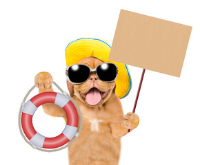 Happy mastiff puppy wearing mirrored sunglasses and summer hat screaming into a megaphone and showing lifebuoy. Isolated on white background