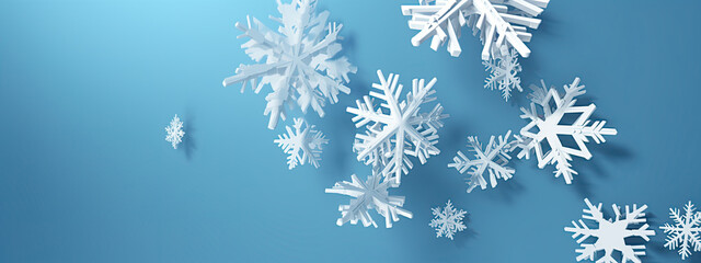 Fototapeta na wymiar White snowflakes on blue winter banner background