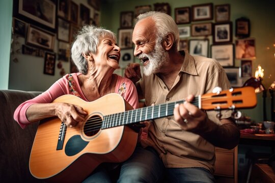 An elderly couple, sitting together at home, share a beautiful and romantic musical moment by playing the guitar, showing their love and togetherness.