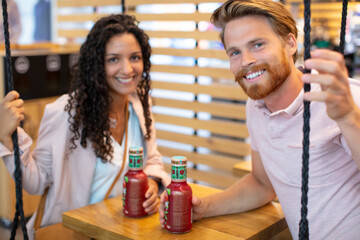 romantic couple dating in a pub