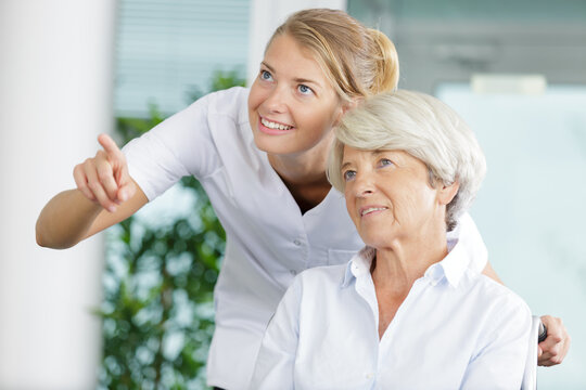 cheerful elderly woman sittig in the wheelchair