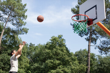 basketball player in action scoring