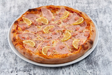fresh pizza on the white plate