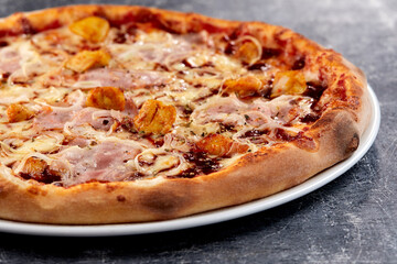 fresh pizza on the white plate