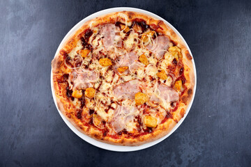 fresh pizza on the white plate