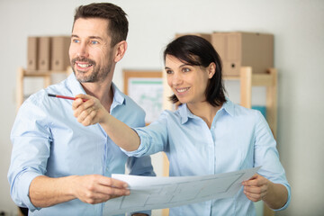 Obraz premium two young architects in office