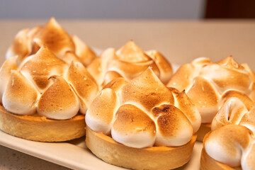 Delicious homemade tartlets on white plate