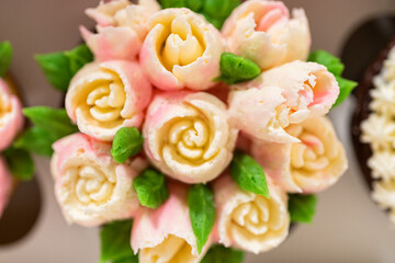 Delicious Gourmet Cupcakes Topped with Buttercream Frosting Flowers