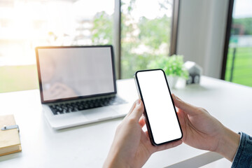 Closed up with Asian man feels relax using smartphone in living room, Blank screen of smartphone