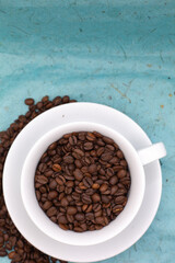 cup of coffee with beans