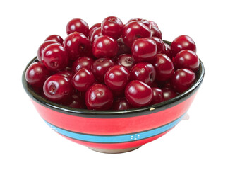 Bowl with ripe cherries. Isolated on a white background.
