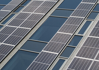 Fototapeta premium Modern Building Facade Adorned with Solar Panels