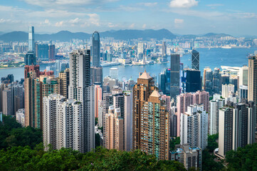 Hong Kong island downtown modern cityscape on a blue sky daytime - obrazy, fototapety, plakaty