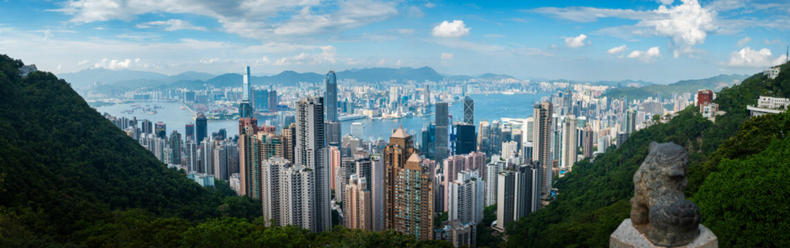 Hong Kong island downtown modern cityscape on a blue sky daytime
