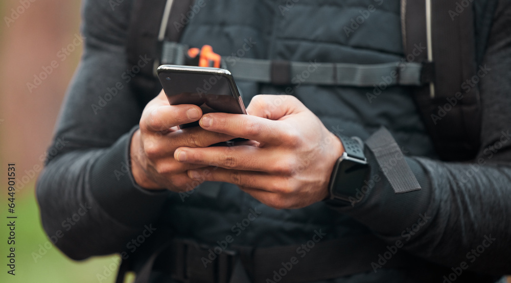 Wall mural Closeup, man and runner with a cellphone, typing and connection with tracking progress, network or contact. Person, runner or hands with digital app, smartphone or break with fitness and social media