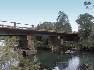 Fototapeta na wymiar old bridge over river