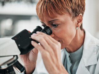 Science, woman closeup and microscope for lab research and studying virus in a hospital or clinic. Scientist, medical study and chemistry expert of a worker with professional project for healthcare