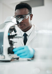 Microscope, black man and analytics with research, medical and experiment for vaccine, test or sample. African person, scientist or researcher with lab equipment, pathology or biotechnology with cure