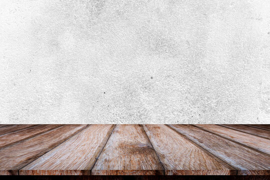 Empty top wooden shelves and stone wall background. Perspective brown wood shelves over stone wall background. - can be used for display or montage your products.Mock up for display of product.